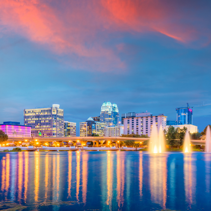 View of downtown Orlando, FL with Lake Eola, highlighting temporary staffing services from a local temp agency.