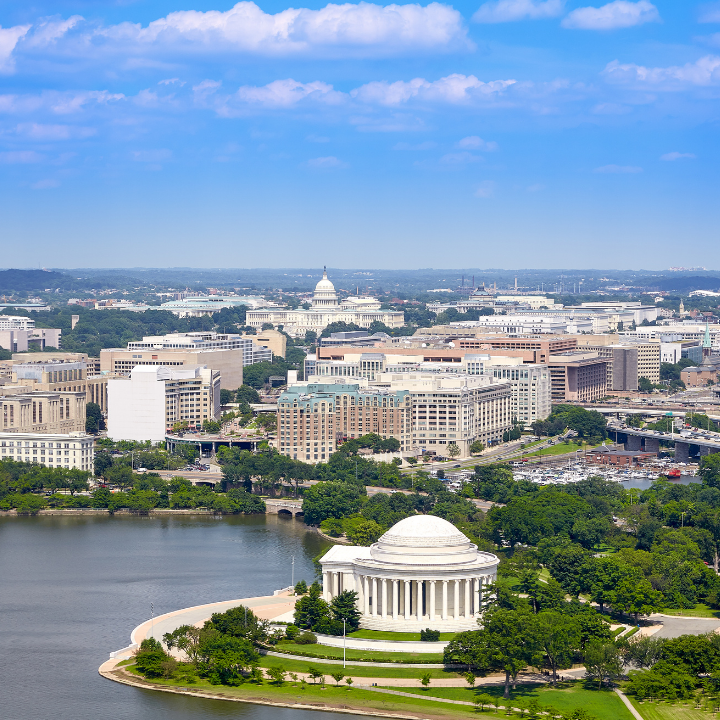 Aerial view of downtown Washington, D.C. featuring the Jefferson Memorial and U.S. Capitol, representing top staffing and consulting services in the nation’s capital.