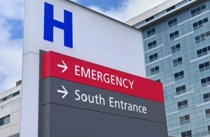 A hospital building exterior, representing administrative support for hospital operations.