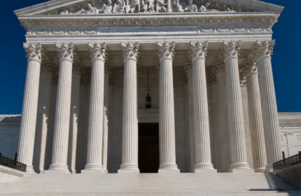 Courthouse-style government building with columns, representing financial support for public sector operations.
