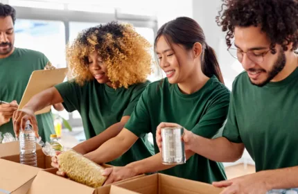 Volunteers preparing supplies, symbolize financial guidance for nonprofit organizations.