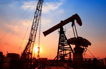 Oil field infrastructure, representing financial management and analysis for energy projects.