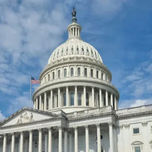 Federal Building with blue skies and an American flag. Beacon Hill Associates staffing and workforce solutions, a leading provider in the U.S.